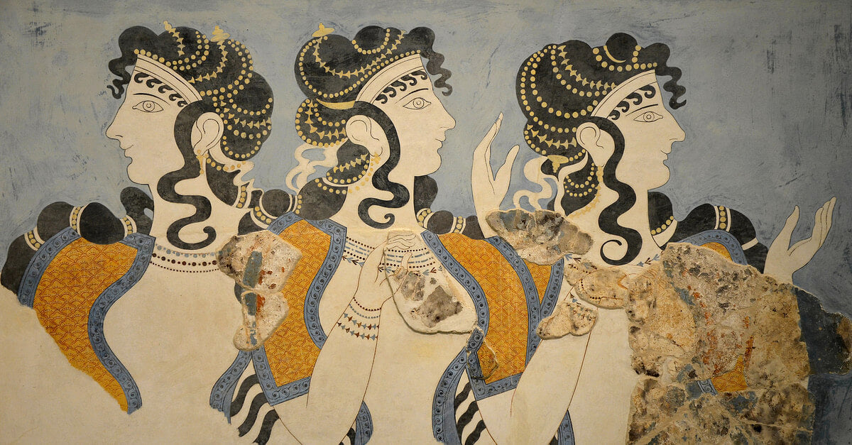 A picture of "Ladies in Blue' fresco on the island of Crete, in the Palace of Knossos. It was created by Swiss artist and archaeological Émile Gilliéron in the Neopalacial period, 1600 - 1450 BCE.