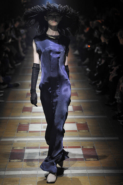 A picture of a model on the catwalk for  Lanvin AW 2014.