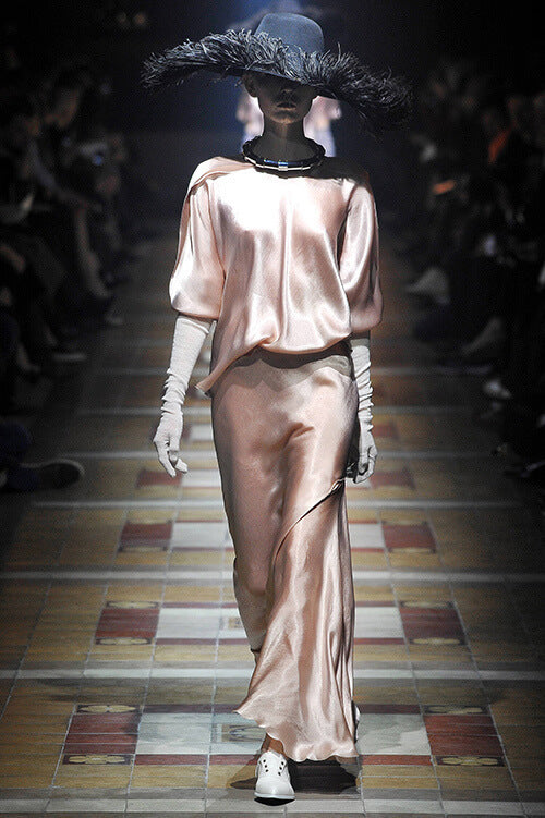 A picture of a model on the catwalk for  Lanvin AW 2014.