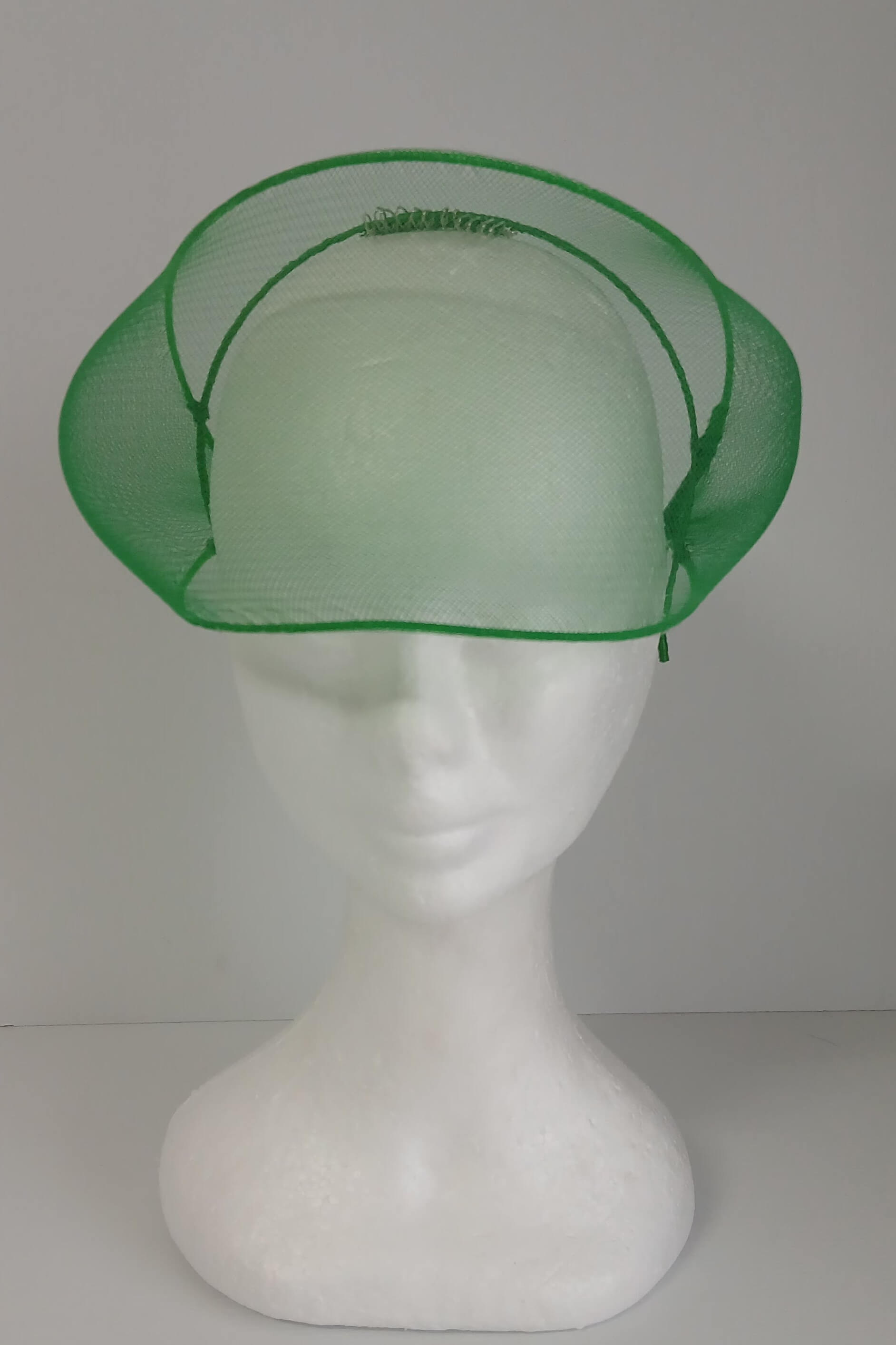 A picture of a green crinoline millinery veil by Melissa Rath Millinery