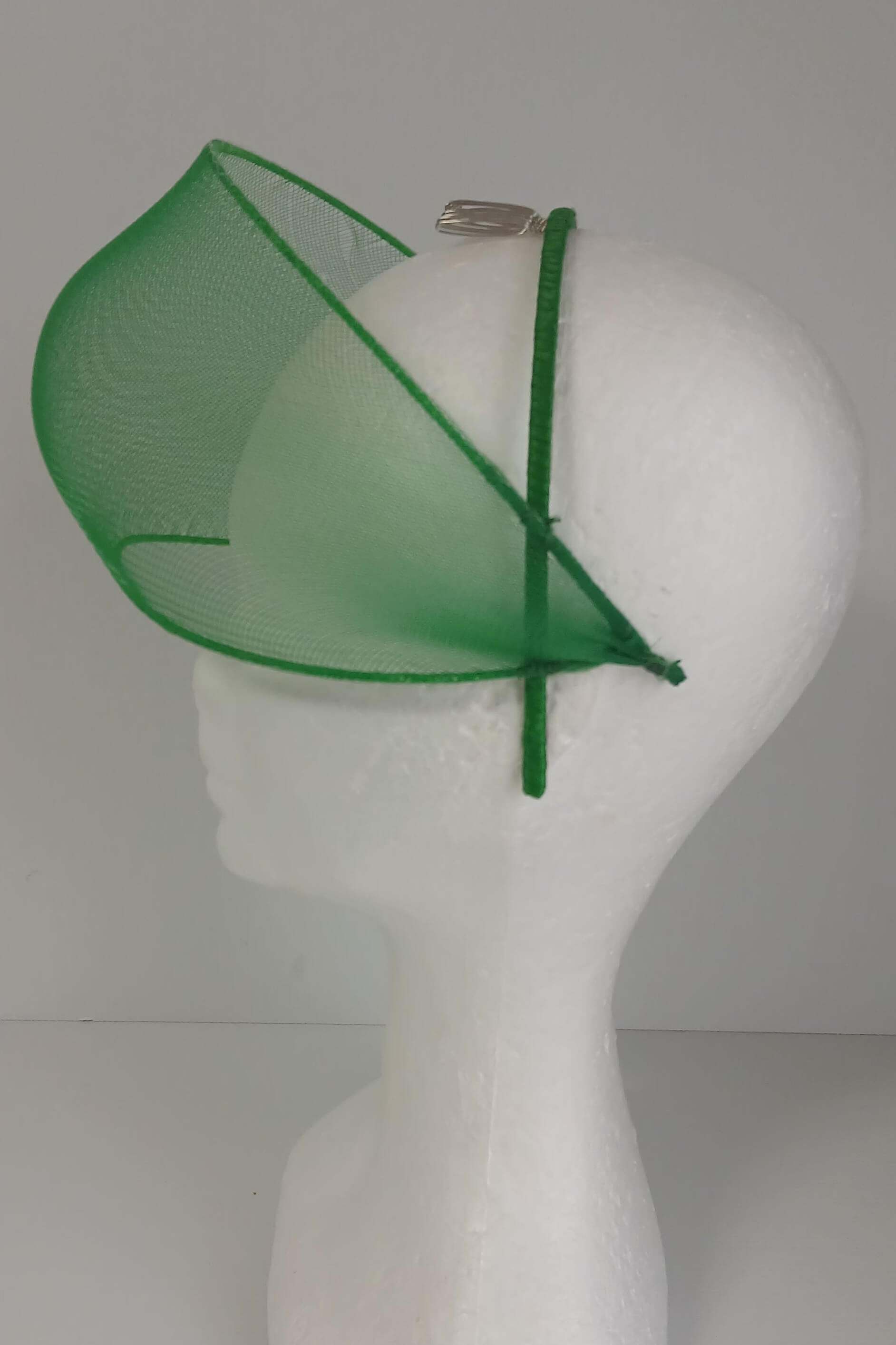 A picture of a green crinoline millinery veil by Melissa Rath Millinery
