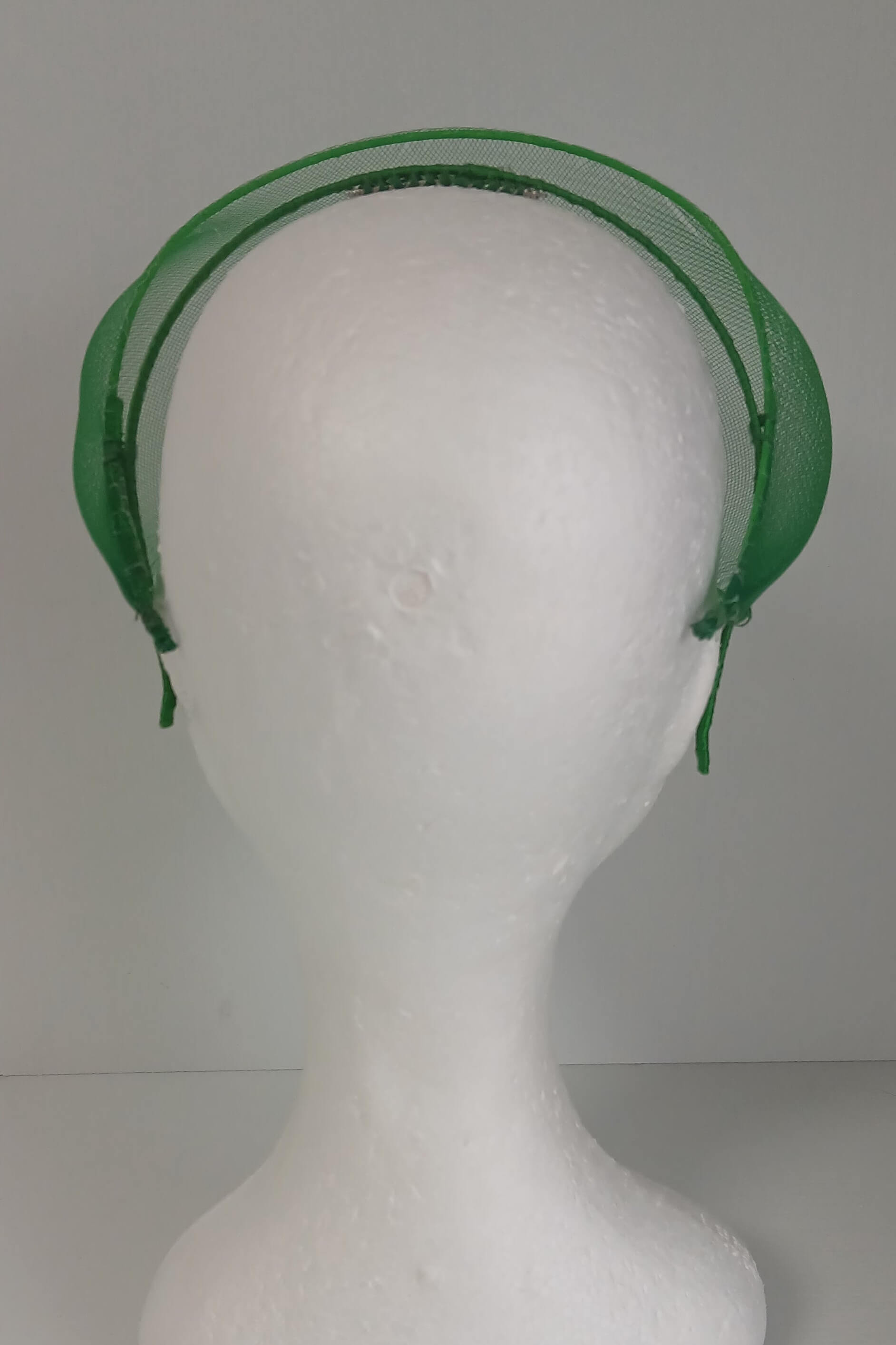 A picture of a green crinoline millinery veil by Melissa Rath Millinery