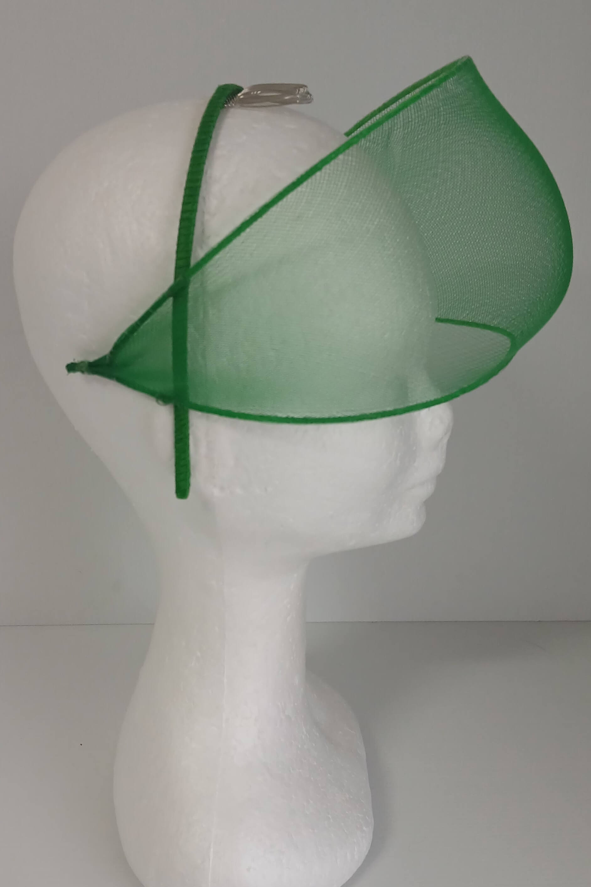 A picture of a green crinoline millinery veil by Melissa Rath Millinery