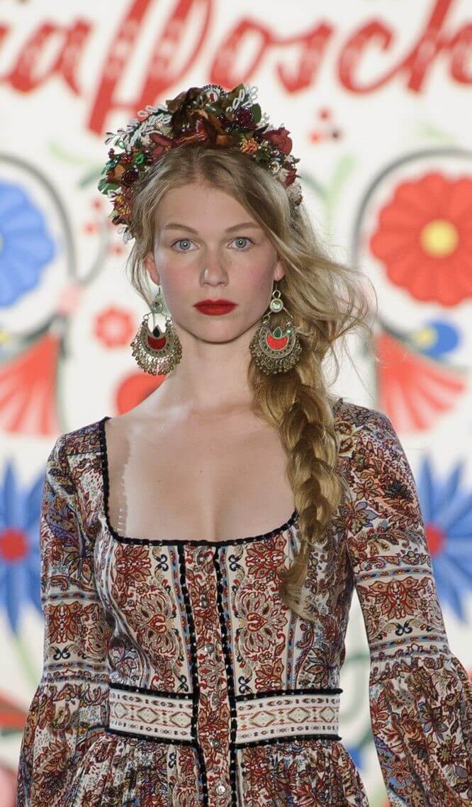 A picture of a model on the catwalk for Lena Hoschek SS 2018 Collection.