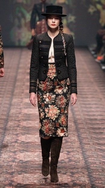 A picture of a model on the catwalk for Lena Hoschek AW 2021.