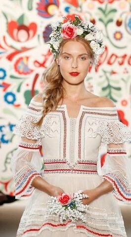 A picture of a model on the catwalk for Lena Hoschek SS 2018 Collection.