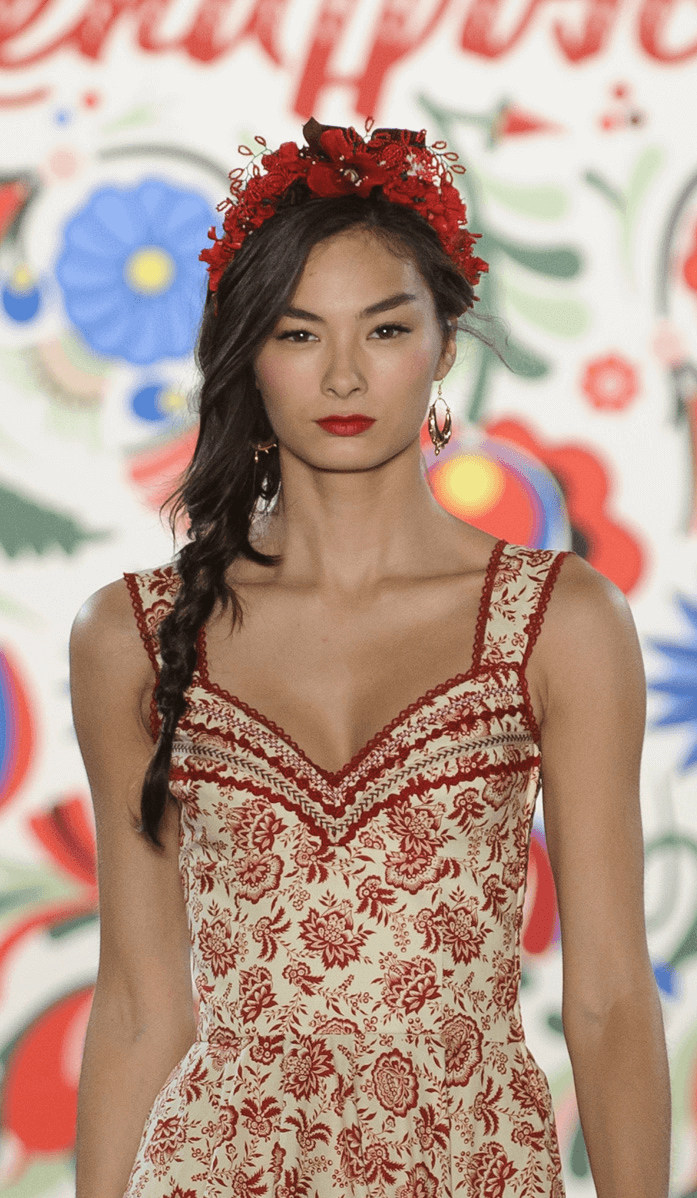 A picture of a model on the catwalk for Lena Hoschek SS 2018 Collection.