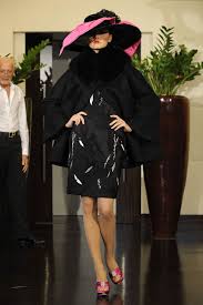 A picture of a model on the catwalk for the Lorenzo Riva Haute Couture Autumn Winter 2009/2010 Catwalk show.