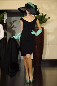 A picture of a model on the catwalk for the Lorenzo Riva Haute Couture Autumn Winter 2009/2010 Catwalk show.
