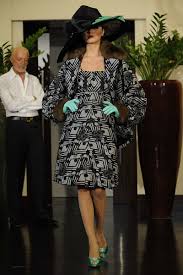 A picture of a model on the catwalk for the Lorenzo Riva Haute Couture Autumn Winter 2009/2010 Catwalk show.