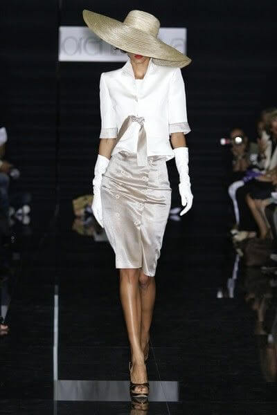 A picture of a model on the catwalk for the Lorenzo Riva Spring Summer Milan 2010 Catwalk show.