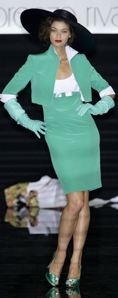 A picture of a model on the catwalk for the Lorenzo Riva Spring Summer Milan 2010 Catwalk show.