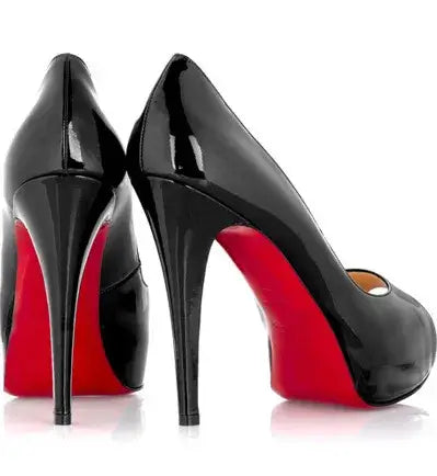 A pair of Louboutin heels with the iconic red sole.