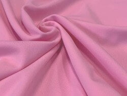 An image of matt pink spandex available from Glitter and Dance