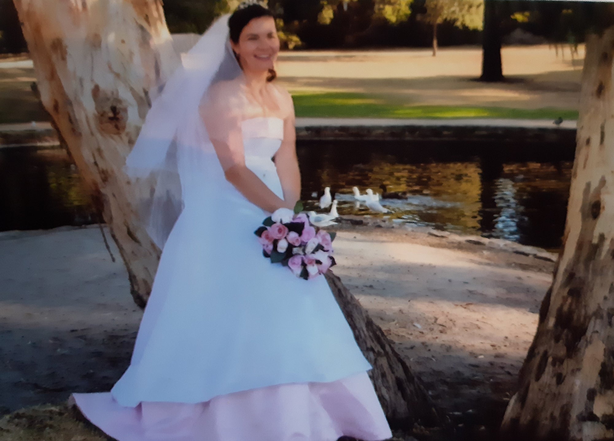 A picture of me when I married my now ex, where I had pink on my wedding dress.