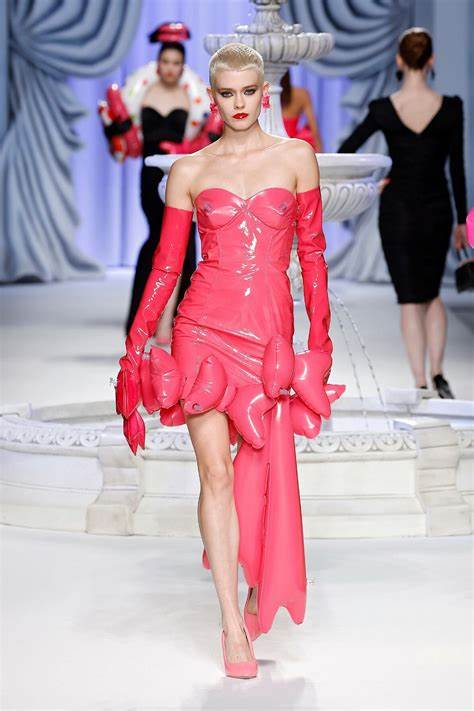 A picture of a model for Moschino 2023 wearing pink