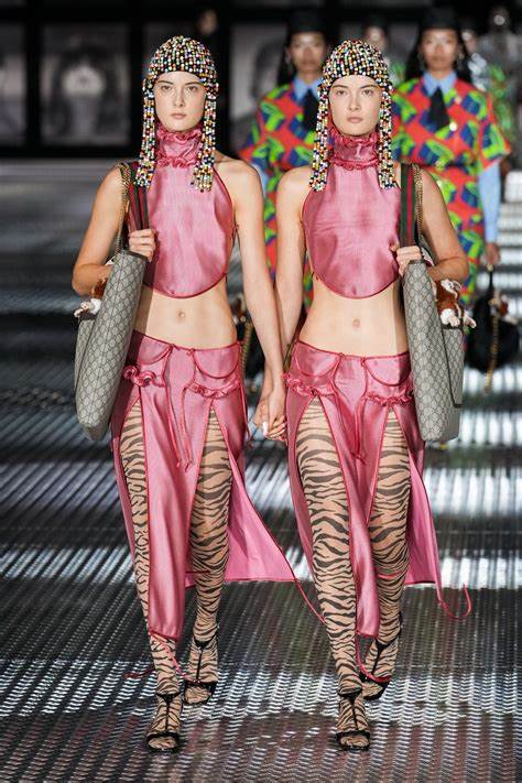 A picture of models for Gucci 2023 wearing pink