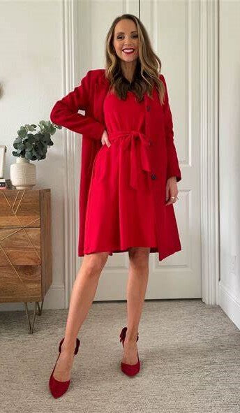A picture of a red monochromatic outfit suggestion for the Red Pleather Heart Headband by Melissa Rath Millinery.