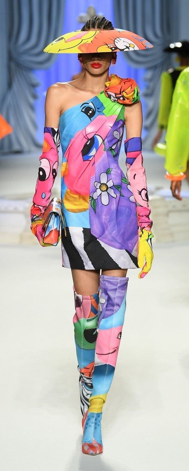 A picture of a model on the catwalk for Moschino 2023.