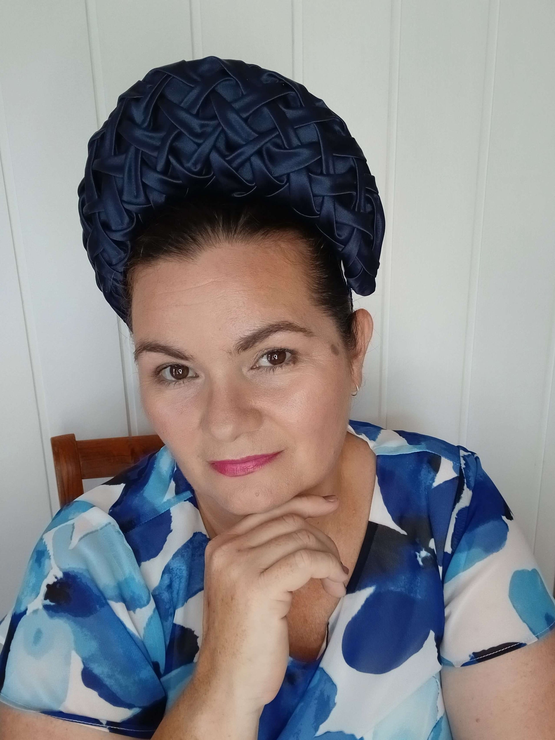 A picture of a Navy Blocked Smocked Millinery Crown by Melissa Rath Millinery