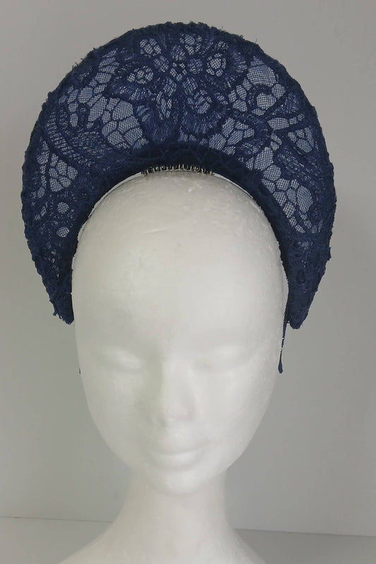 A navy millinery crown by Melissa Rath Millinery, made from crinoline and with a lace overlay.