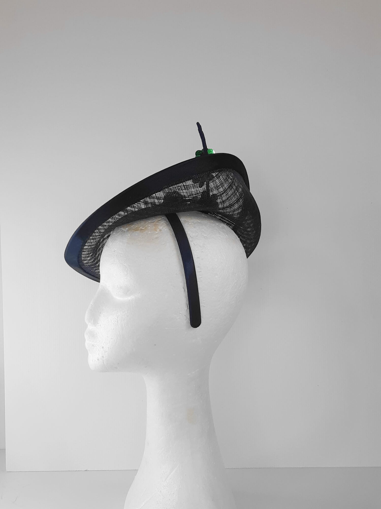 A picture of a Navy and Green Saucer Hat with  by Melissa Rath Millinery.