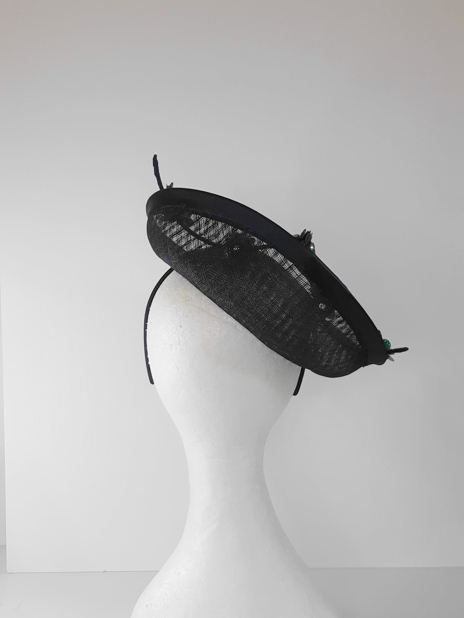 A picture of a Navy and Green Saucer Hat with  by Melissa Rath Millinery.