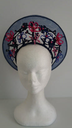 A picture of a Navy and Pink Beaded Crinoline Crown by Melissa Rath Millinery.