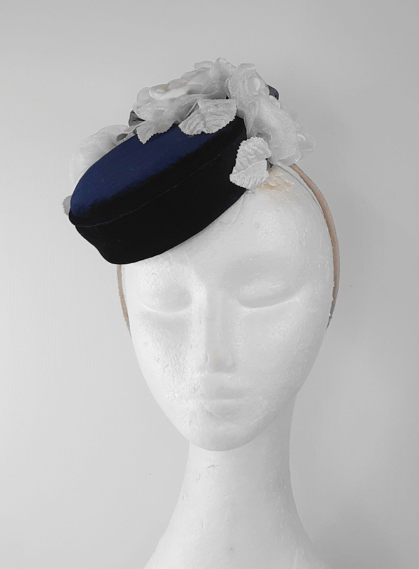 A picture of a Navy and White Velvet Millinery Fascinator by Melissa Rath Millinery.