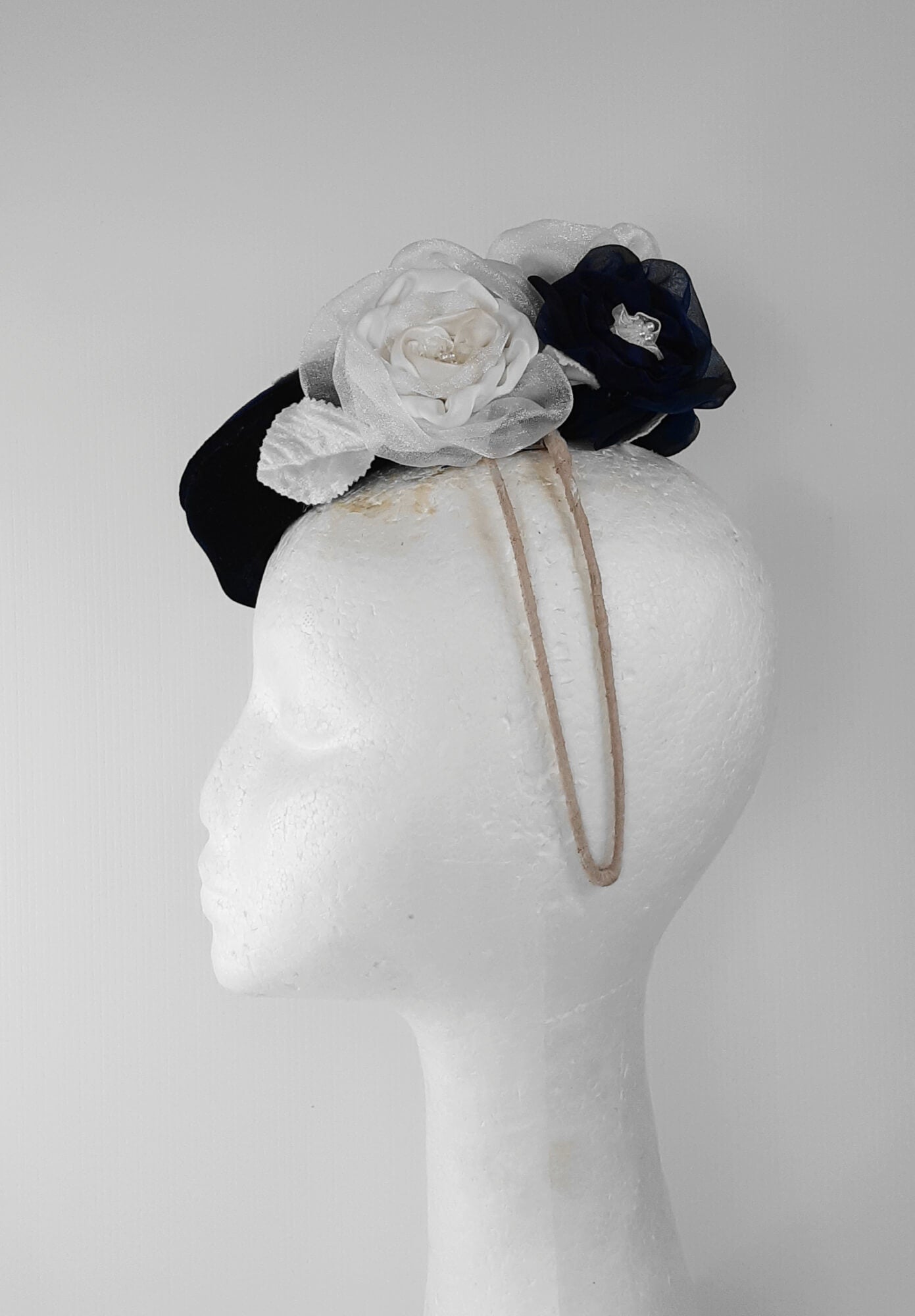 A picture of a Navy and White Velvet Millinery Fascinator by Melissa Rath Millinery.