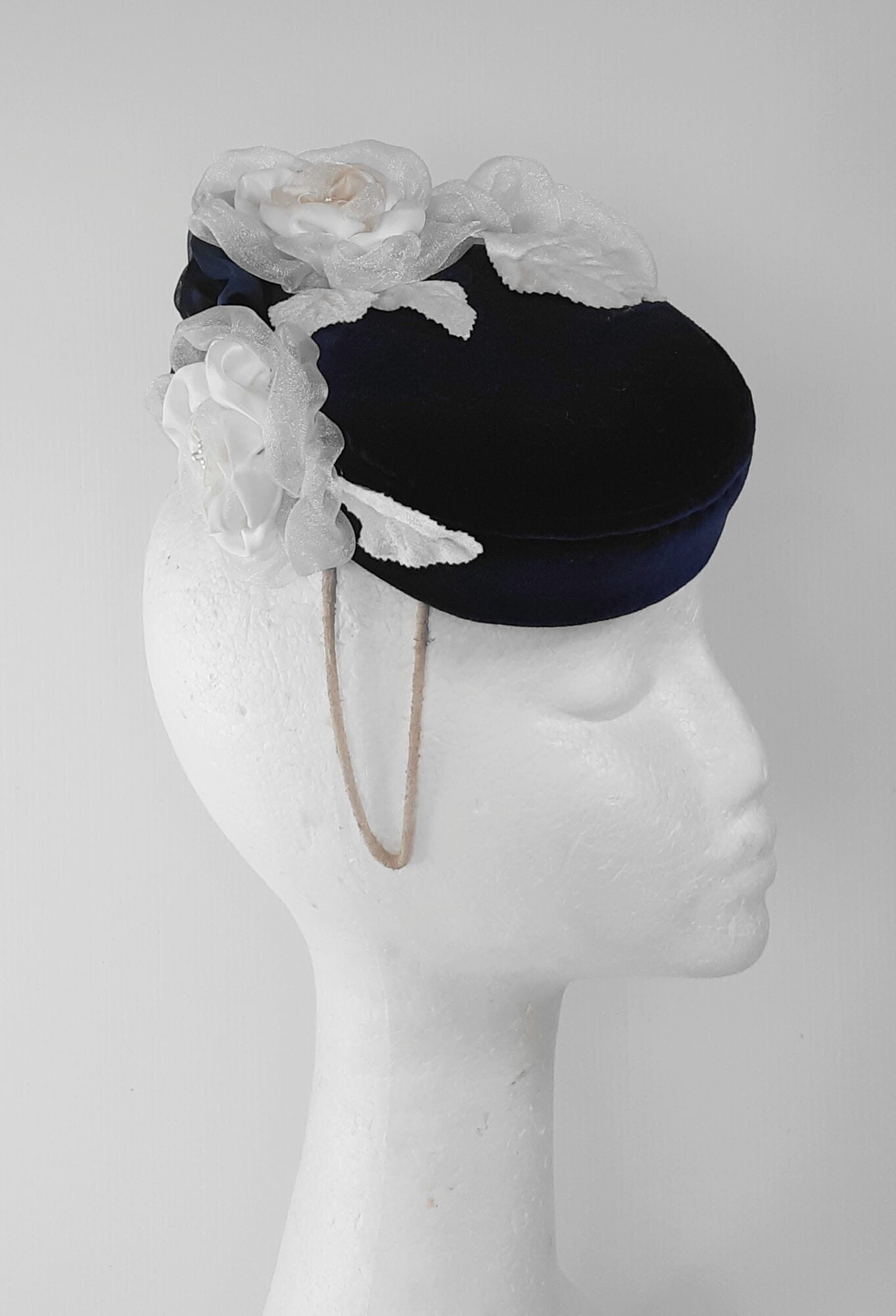 A picture of a Navy and White Velvet Millinery Fascinator by Melissa Rath Millinery.