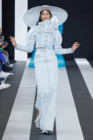 A picture of a model on the catwalk for Nina Ricci AW 2023.