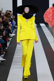 A picture of a model on the catwalk for Nina Ricci AW 2023.