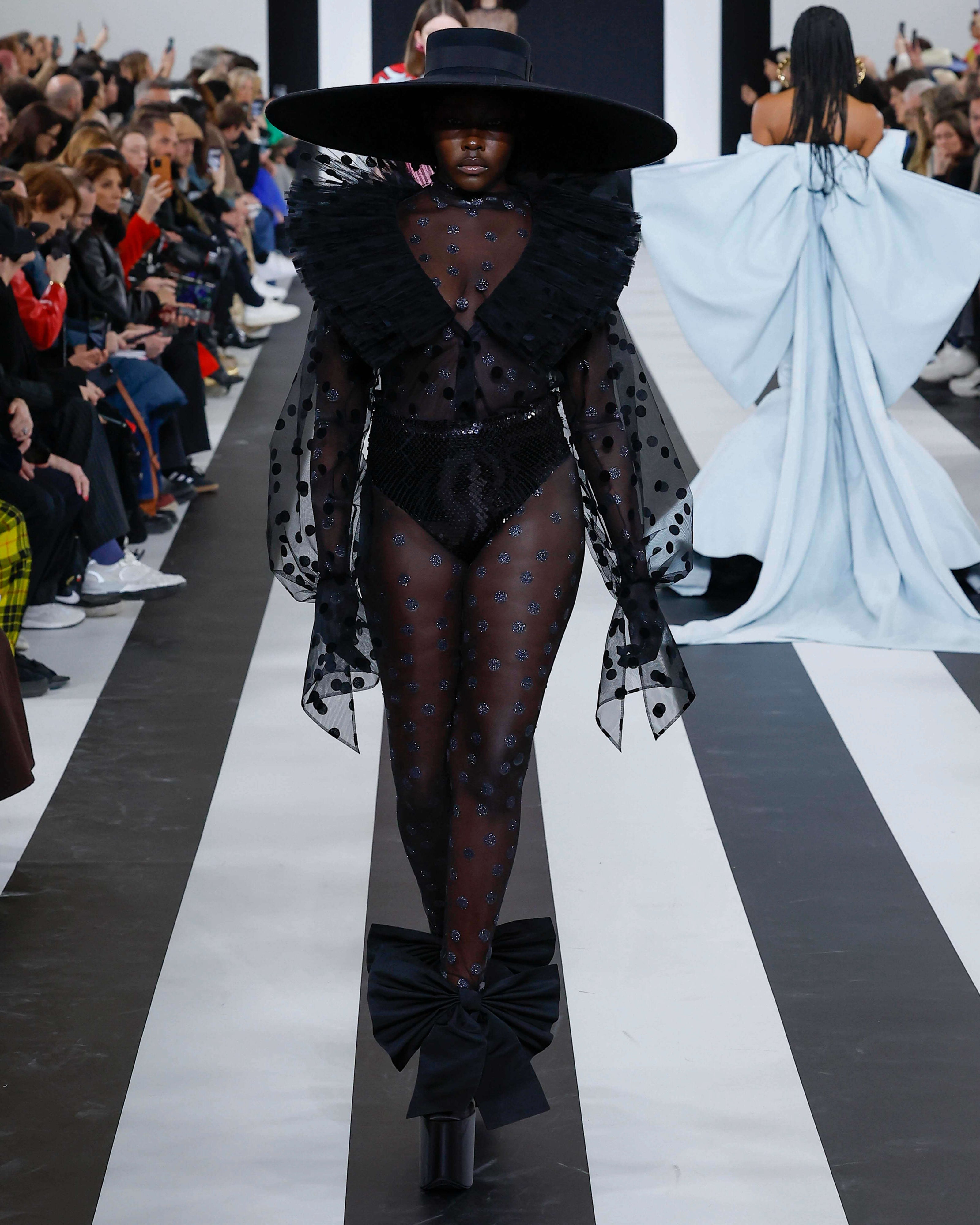 A picture of a model on the catwalk for Nina Ricci AW 2023.