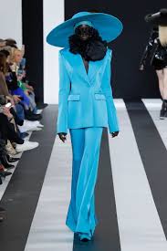 A picture of a model on the catwalk for Nina Ricci AW 2023.
