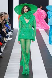 A picture of a model on the catwalk for Nina Ricci AW 2023.