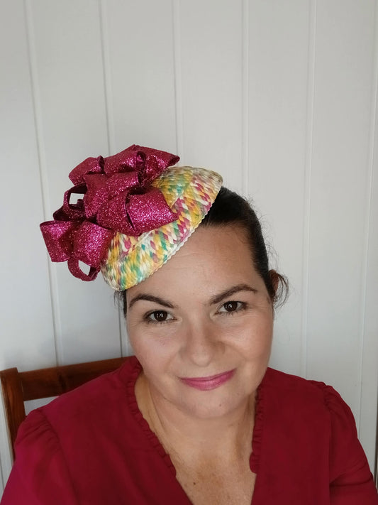A picture of a Paper Braid Fascinator by Melissa Rath Millinery.