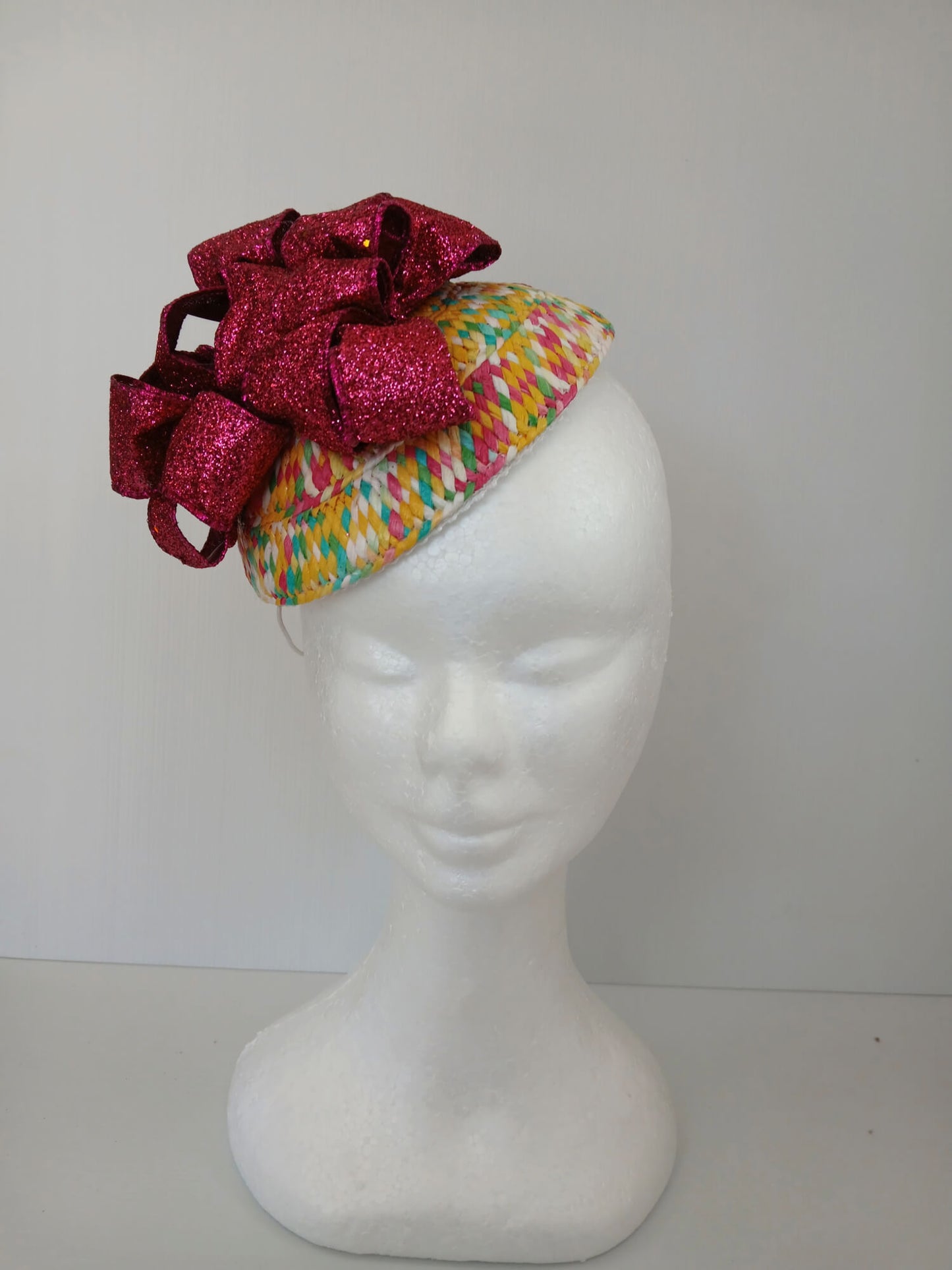 A picture of a Paper Braid Fascinator by Melissa Rath Millinery.