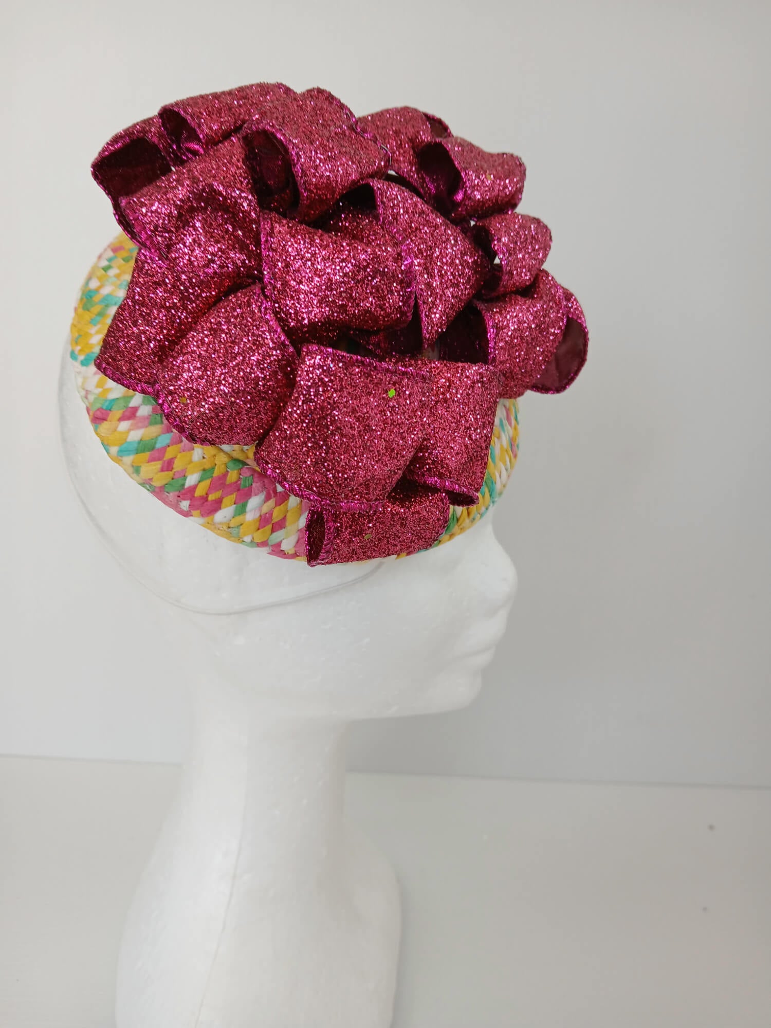 A picture of a Paper Braid Fascinator by Melissa Rath Millinery.