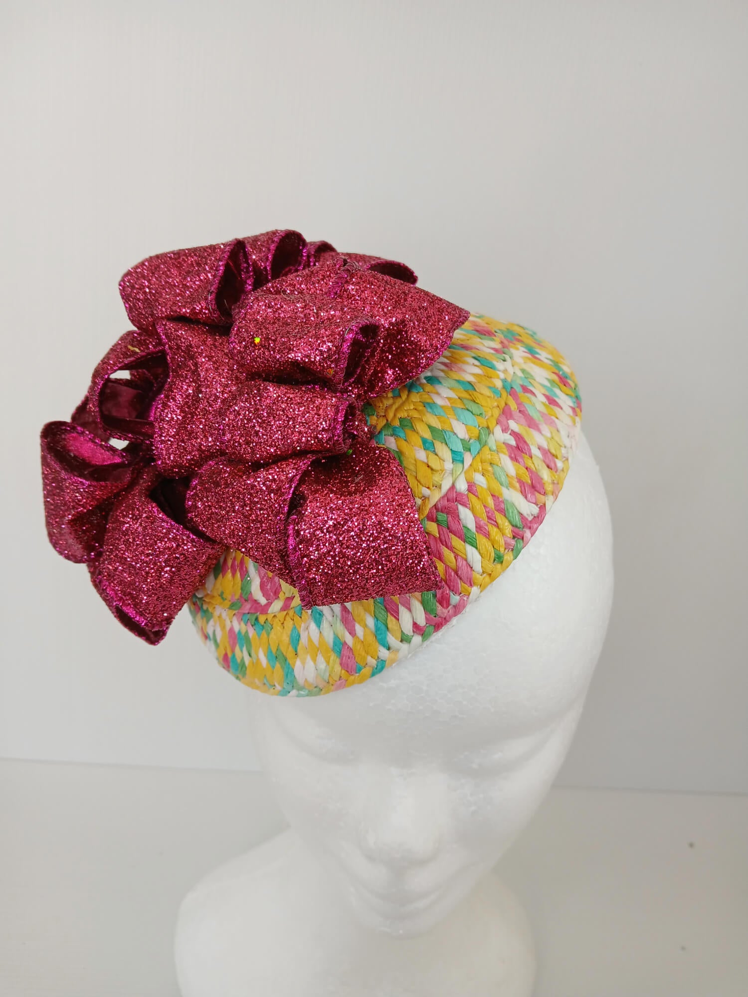 A picture of a Paper Braid Fascinator by Melissa Rath Millinery.