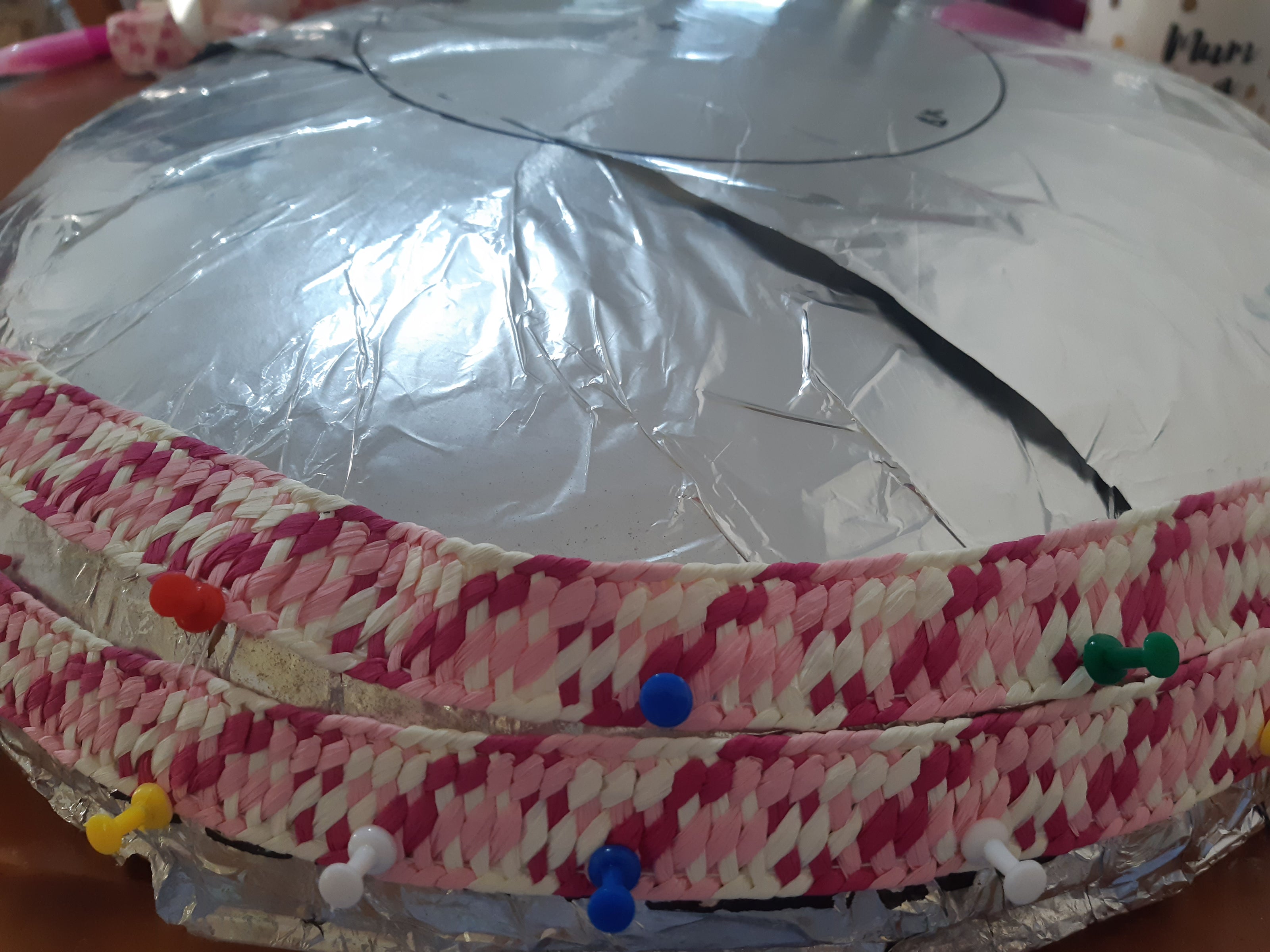 A picture of the making of the Paper Braid Wide Brimmed Hat by Melissa Rath Millinery.