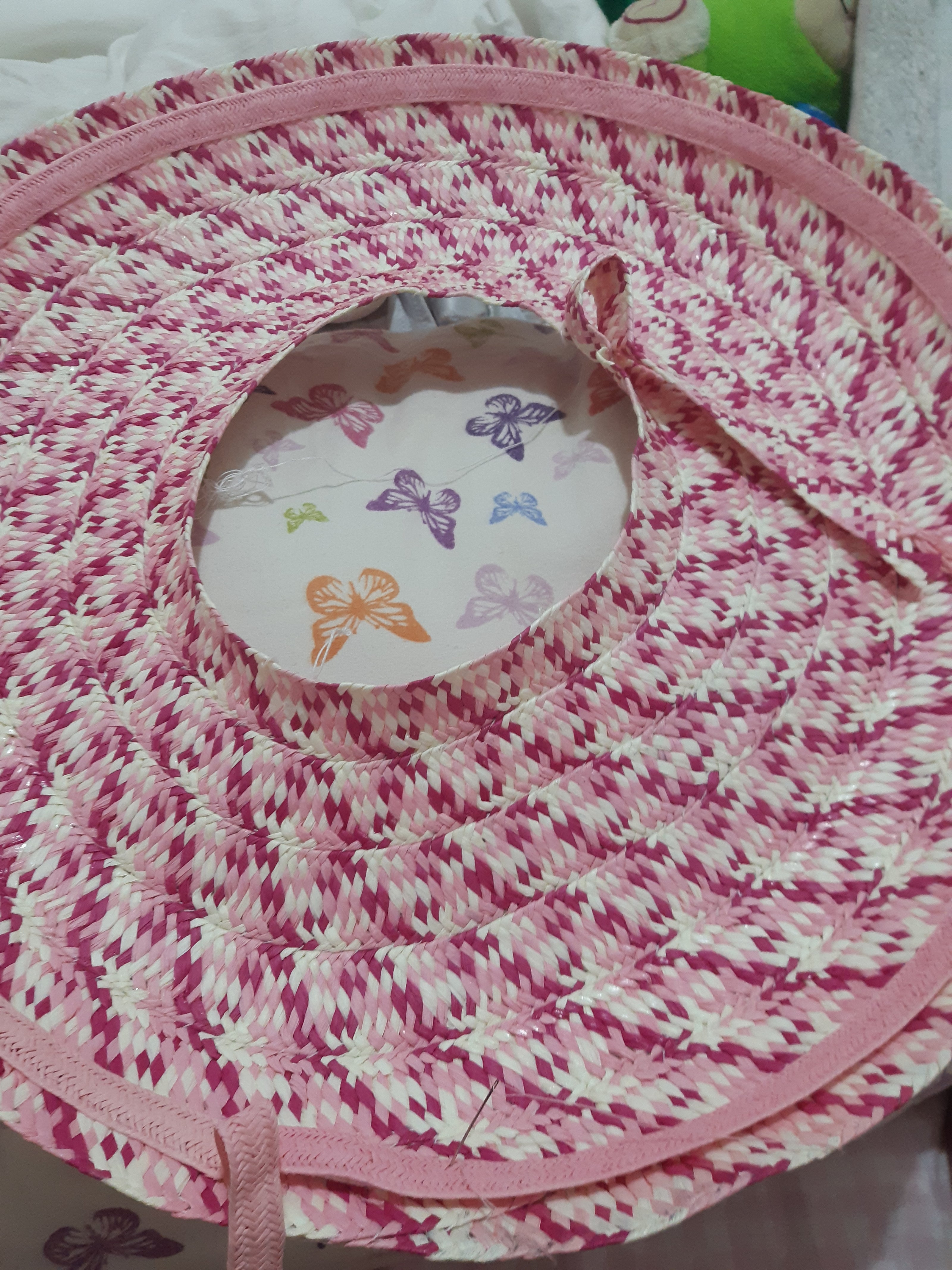 A picture of the making of the Paper Braid Wide Brimmed Hat by Melissa Rath Millinery.