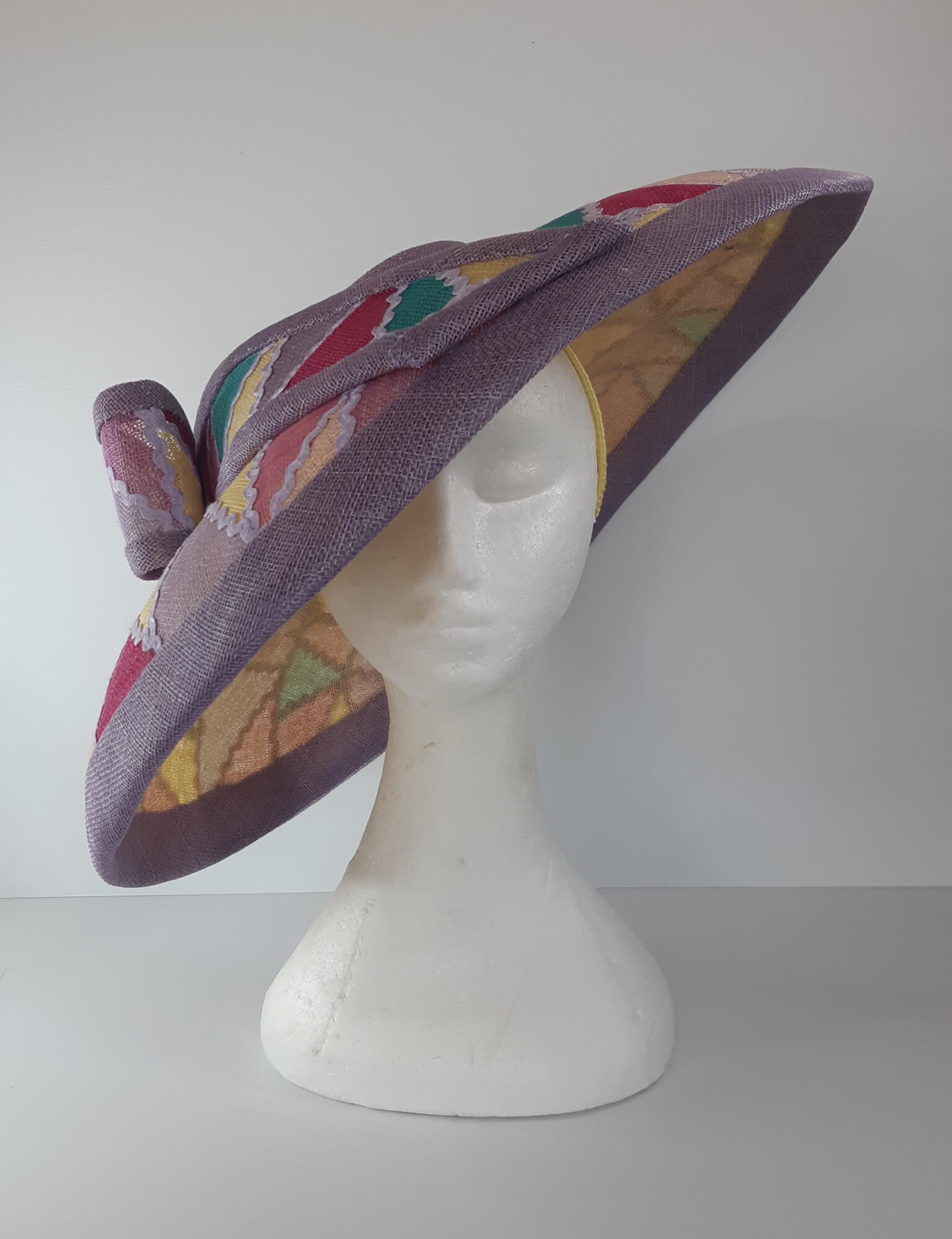 A picture of a wide brim patchwork hat by Melissa Rath Millinery.