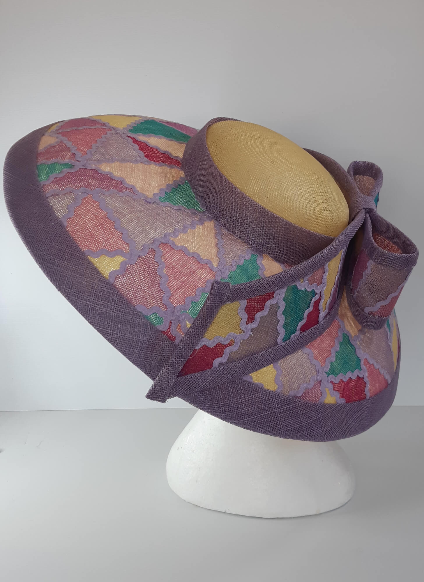 A picture of a wide brim patchwork hat by Melissa Rath Millinery.
