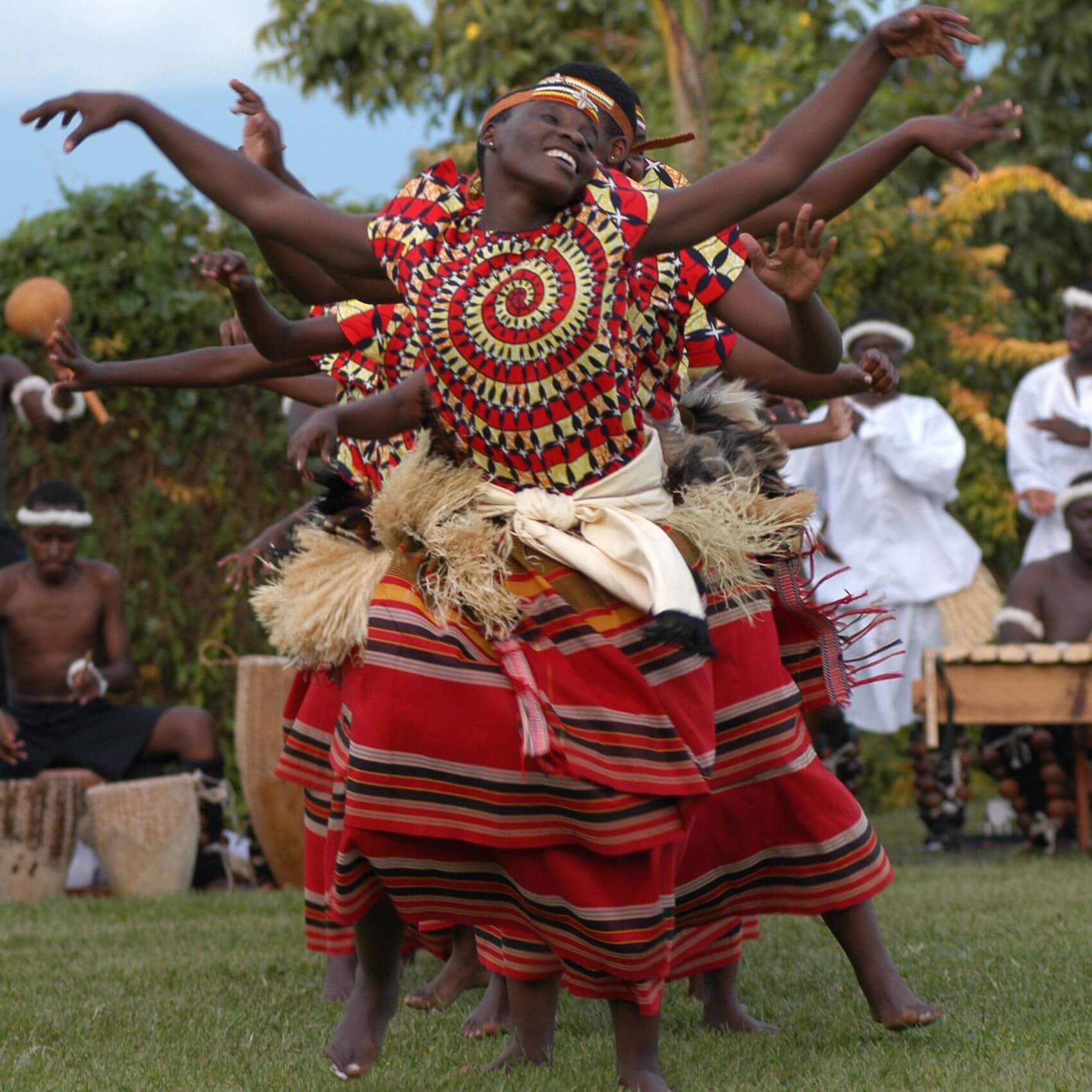 A picture of People performing a traditional African dance.