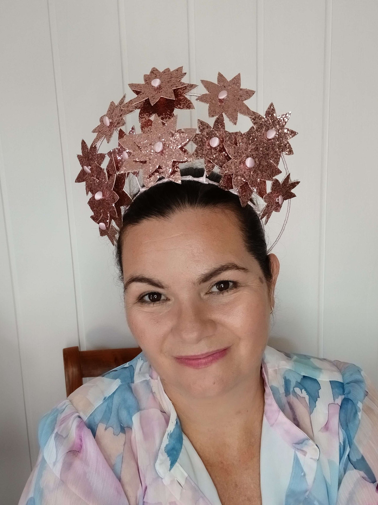 A picture of a Pink Pleather Millinery Crown by Melissa Rath Millinery