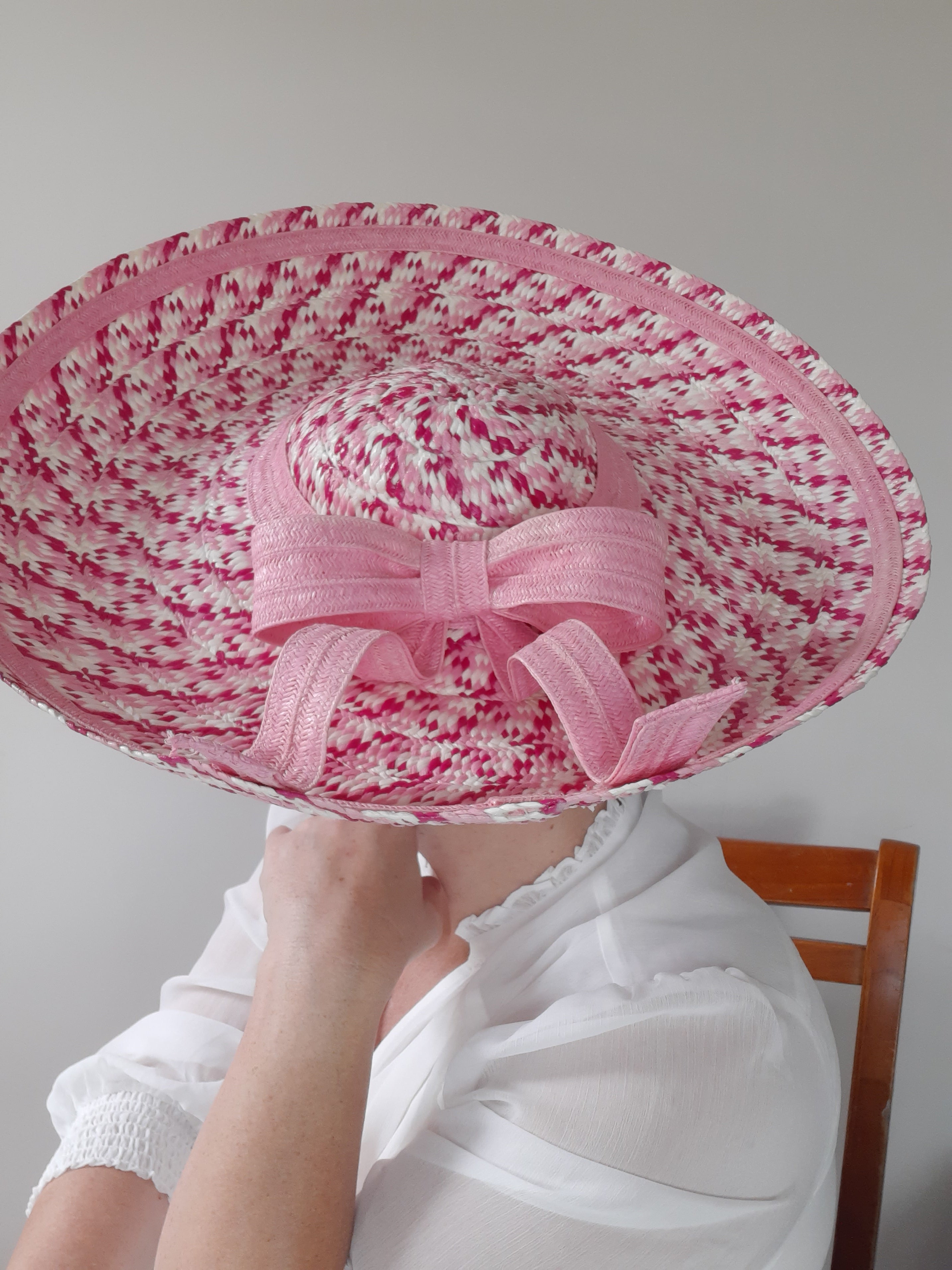 A picture of a Pink Paper Braid Saucer Hat by Melissa Rath Millinery