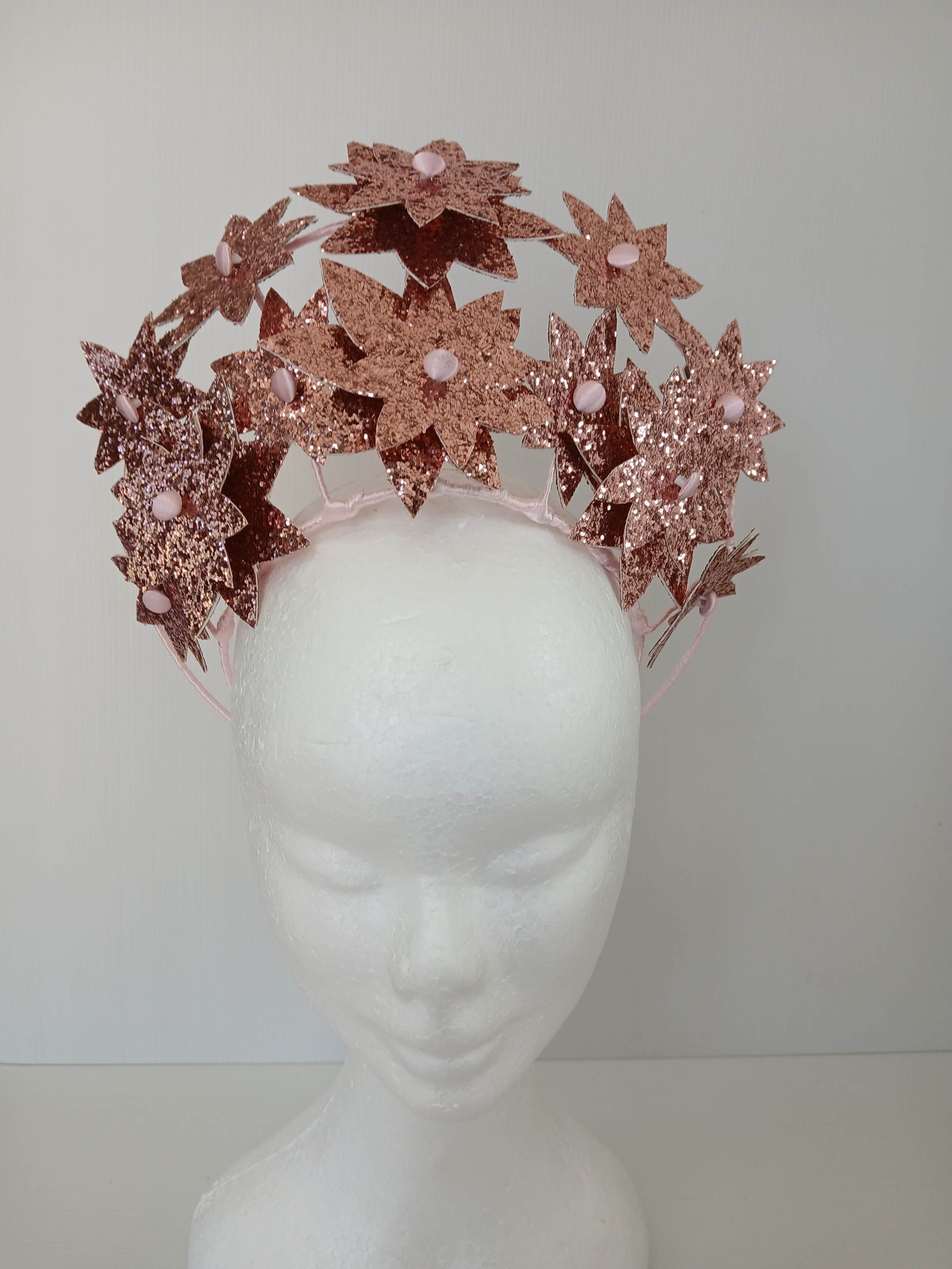 A picture of a Pink Pleather Millinery Crown by Melissa Rath Millinery