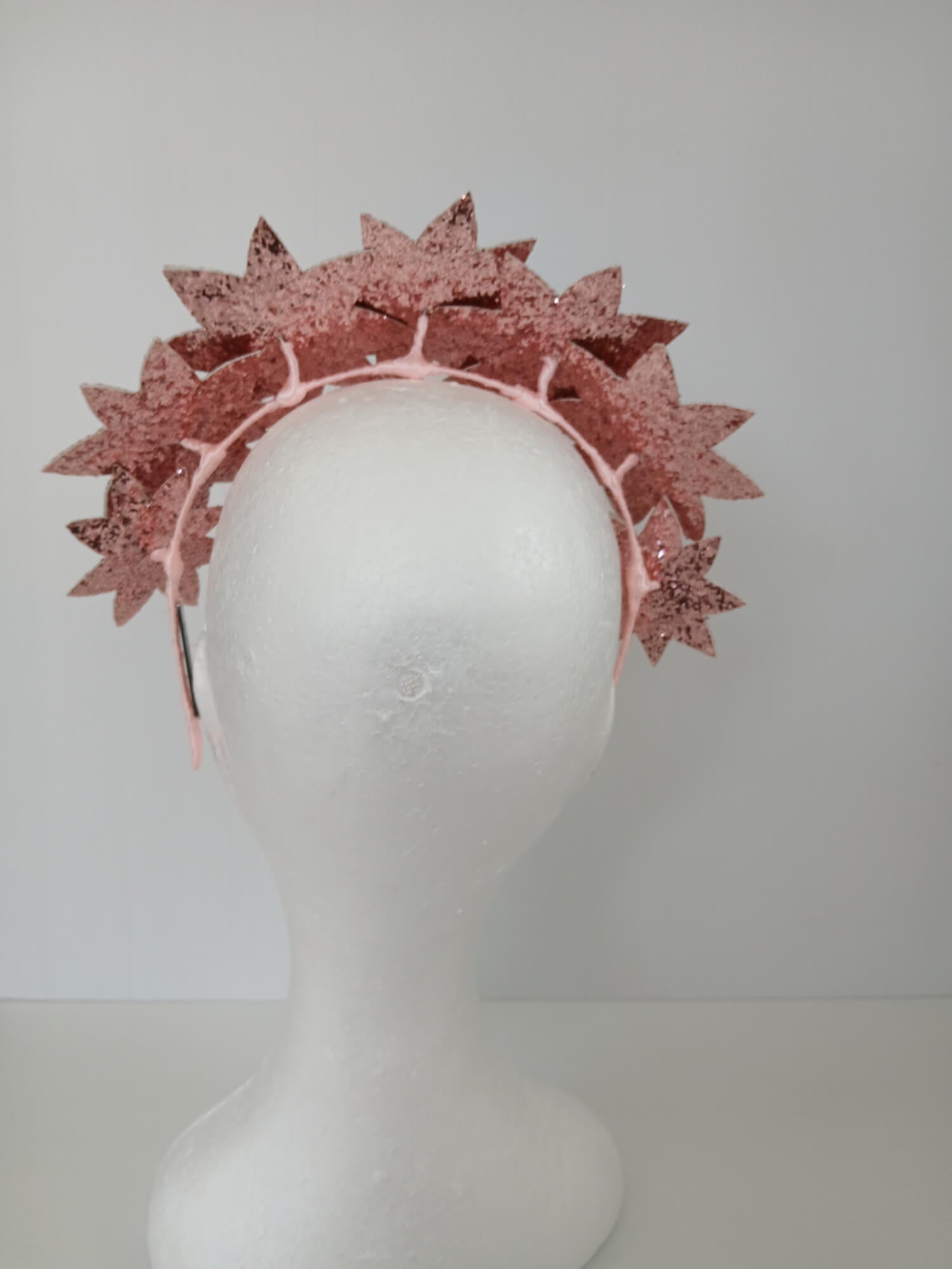 A picture of a Pink Pleather Millinery Headband by Melissa Rath Millinery