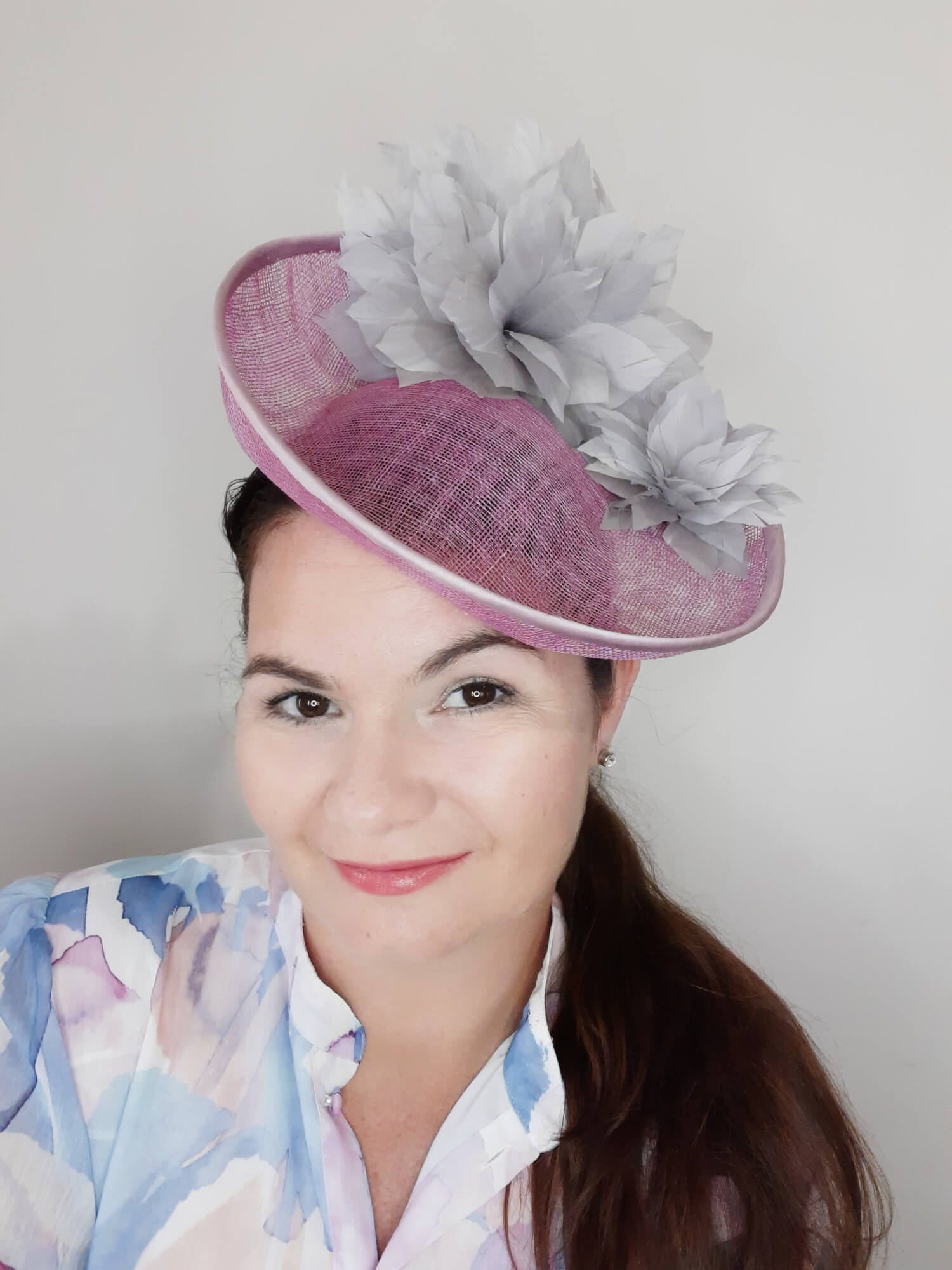 A picture of a Pink and Silver Saucer hat by Melissa Rath Millinery.